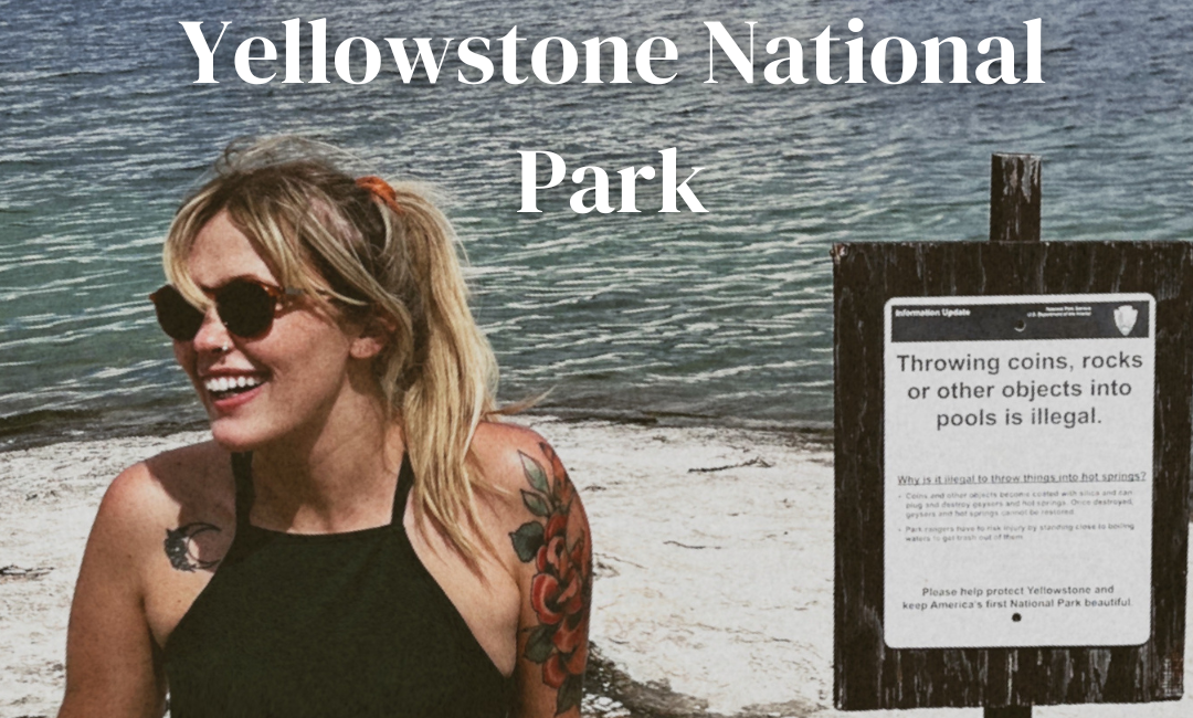 Excited traveler taking in the stunning view of Yellowstone Lake in Yellowstone National Park